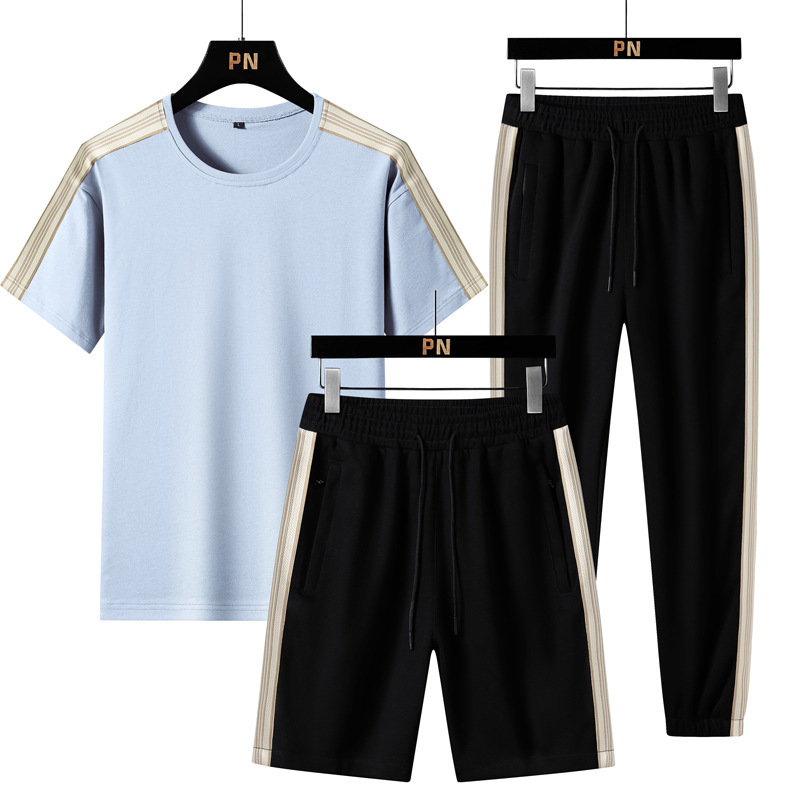 Verano nuevo estilo suelto tendencia hombre estilo Hong Kong camiseta de manga corta deporte de dos piezas marca de moda traje casual hombres y mujeres