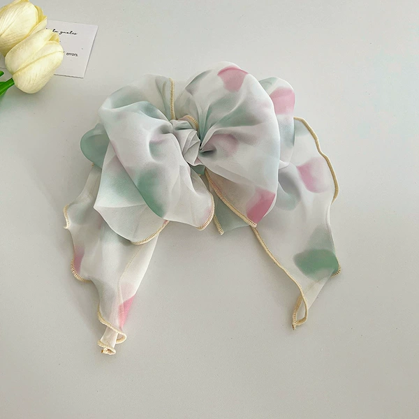 Green hairgrip with bow