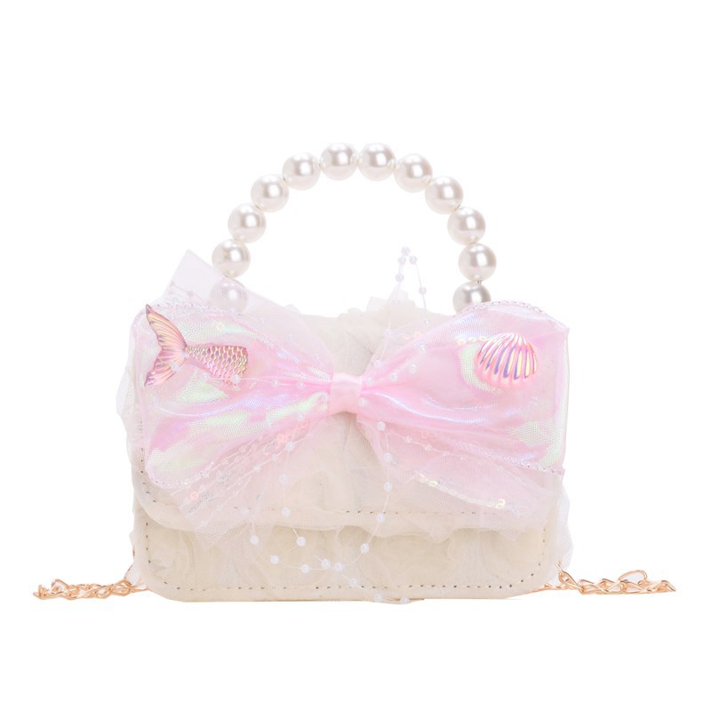 Dulce princesa bolso de hombro de perlas de aire extranjero bolso de mano bebé 2025 nuevo bolso de moda para niños
