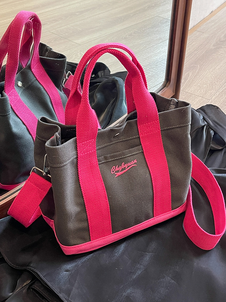 Bolso de hombro para mujer de nicho nuevo para otoño 2023, estilo coreano de internet, bolso de lona casual de mano, bandolera versátil para estudiantes