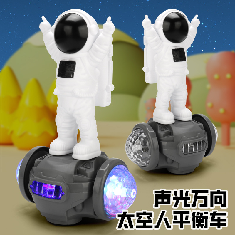 Vehículo de equilibrio de astronauta universal eléctrico para niños, luz de música colorida, carro de juguete para niños al por mayor