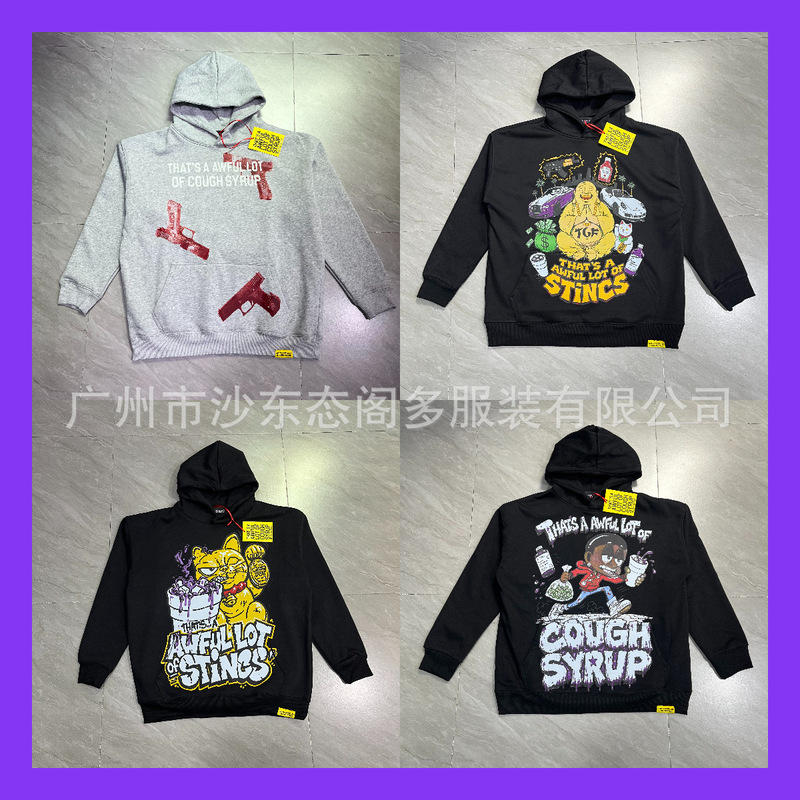 TRALESIDOS American street hip-hop purple ink-print graffiti sweatshirt with Garfield cat design, loose-fitting hooded sweatshirt TRALESIDOS American street hip-hop purple ink-print graffiti sweatshirt with Garfield cat design, loose-fitting hooded sweatshirt