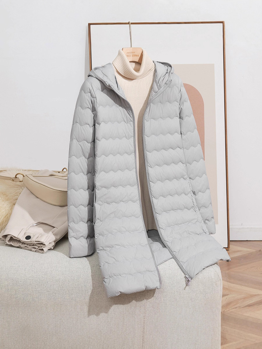 2025 otoño y invierno nueva moda encapuchada onda media y larga chaqueta de pluma ligera y delgada chaqueta con cremallera de mujer caliente marea