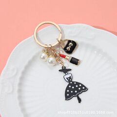 女性の素敵なキーホルダーノベルティキーホルダー魅力的なアクセサリーパールキーチェーン装飾バッグマネー用