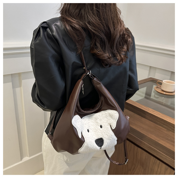 The new autumn and winter 2024 fashion cartoon backpack with simple, individual and niche design, single-shoulder bag and commuter tote bag undefined