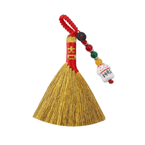 The same style of woven Dragon Boat Festival gold broom pendant is used to transport bad luck and is a handmade broom that can be used as a baby bedside pendant to suppress shock.