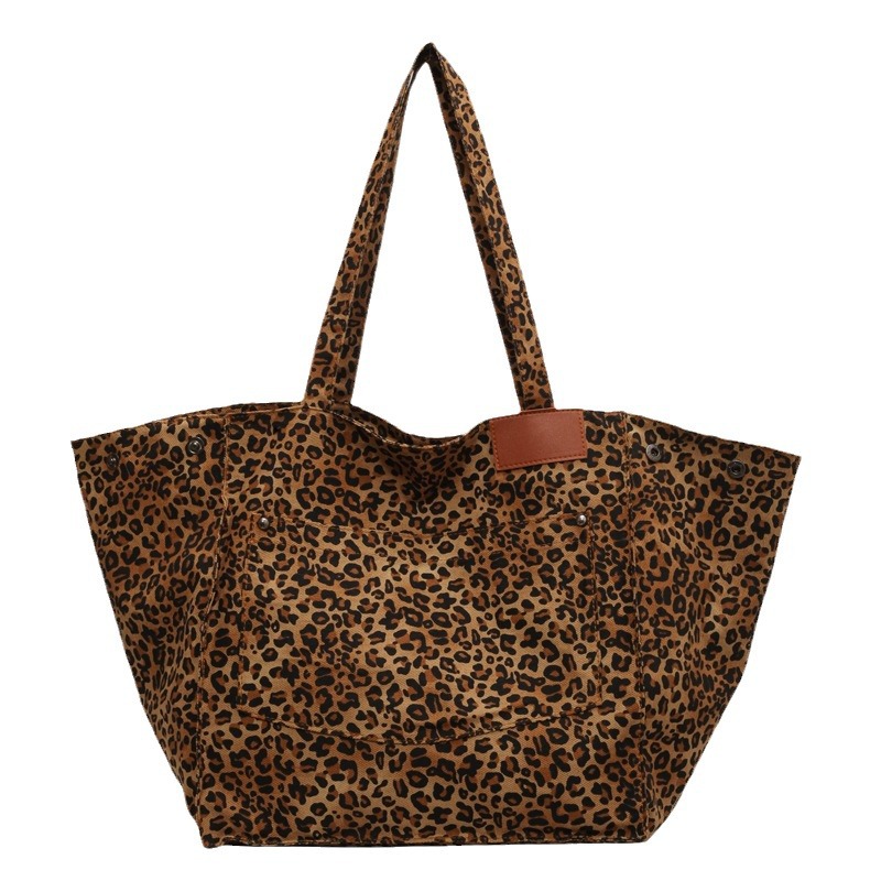Bolsa de leopardo de comercio exterior mochila inclinada nueva calle frita de Flores rotas en el otoño de 2024 bolsa de mujeres explosivas transfronterizas tote de gran capacidad