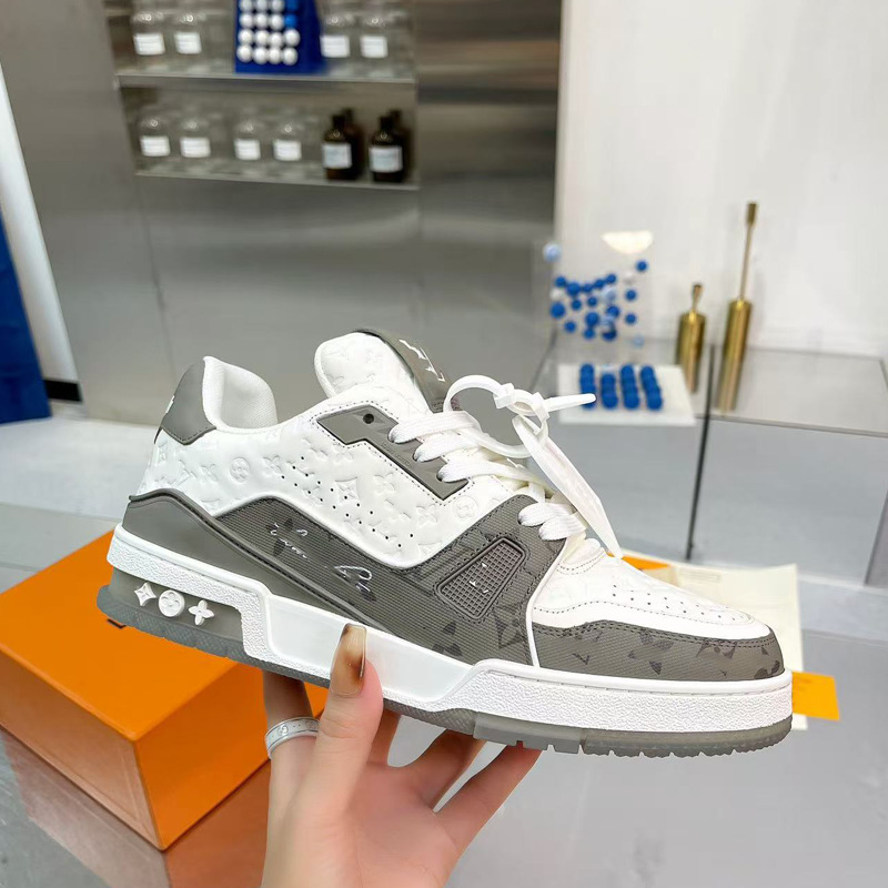Zapatos de moda europeos Guangzhou de alta versión驴 entrenador zapatos deportivos ociosos de cuero universal para hombres y mujeres