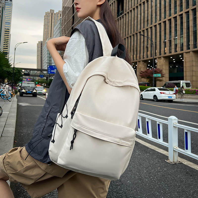 2024 nueva mochila simple de color sólido, estudiantes de secundaria y preparatoria, mochila escolar de viaje de gran capacidad al por mayor