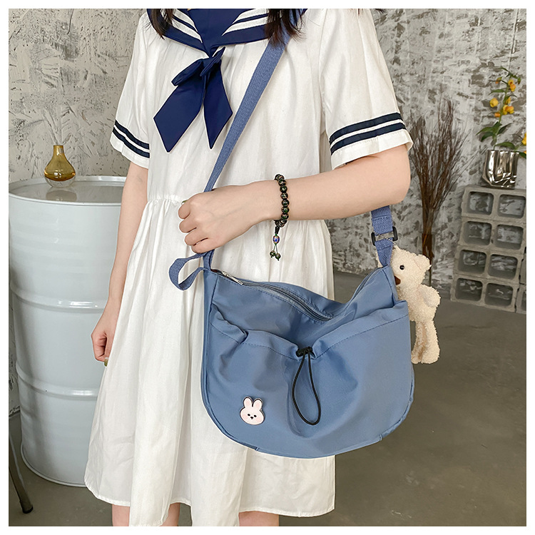 The new 2022 Little Bear canvas small bag for women is simple and versatile. The student dumpling bag is a trendy casual single-shoulder crossbody bag undefined