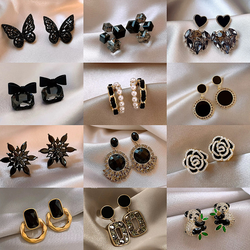Pendientes geométricos de cristal negro con aguja de plata Pendientes de todo fósforo de nicho Temperamento de moda Pendientes de alta gama de lujo ligero al por mayor