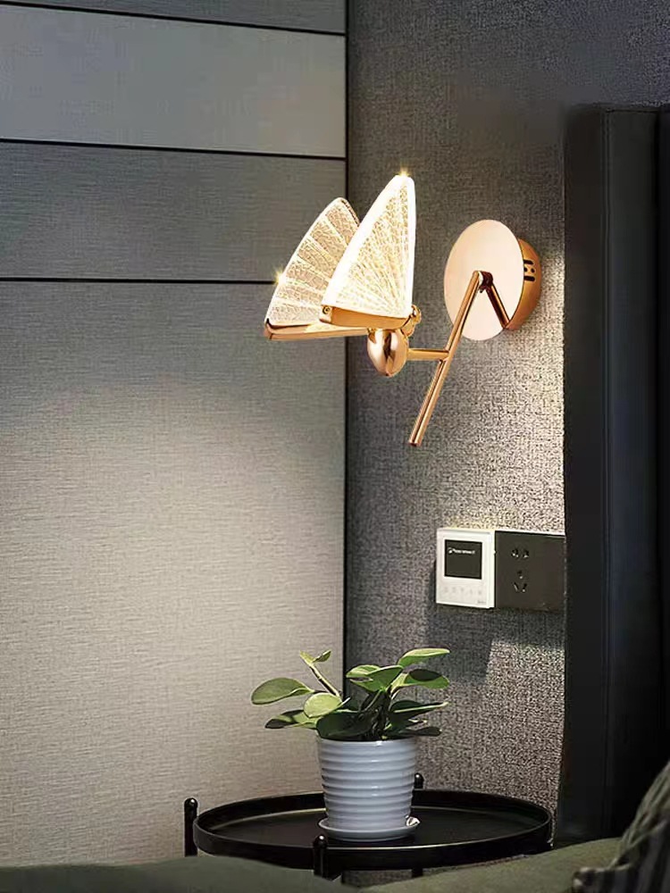 Diseño de una serie de luces de pared de fondo de dormitorio de diseño de iluminación moderna transfronteriza diseño de fondo mariposa