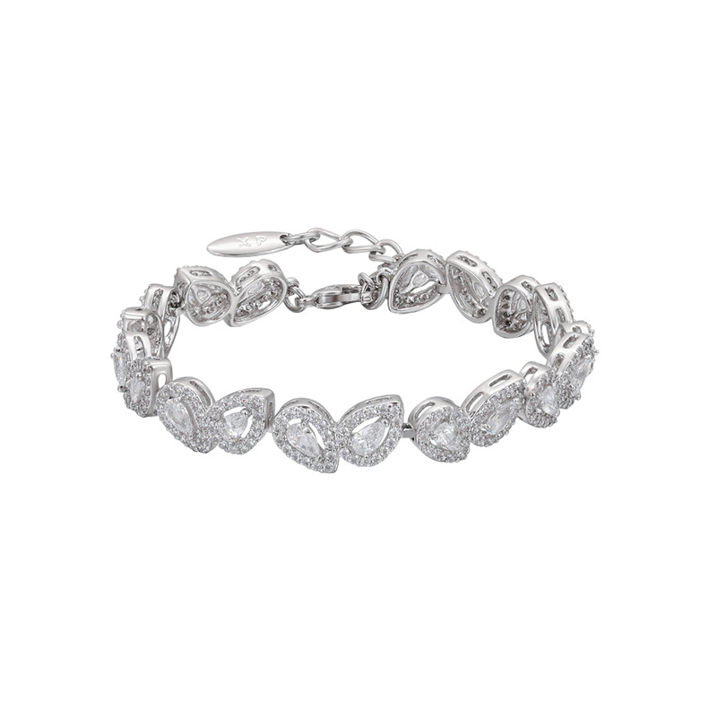Xuping estilo simple incrustación de joyas preciosas artificiales pulseras de aleación de cobre chapado gotas de agua blanca lujosa ligera joyas al por mayor