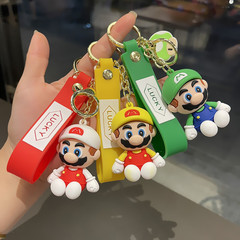 漫画のマリオのキーホルダーの女性の精巧でかわいいペンダントのぬいぐるみのカップルのカバンは自動車のキーチェーンの男子学生を飾ります。