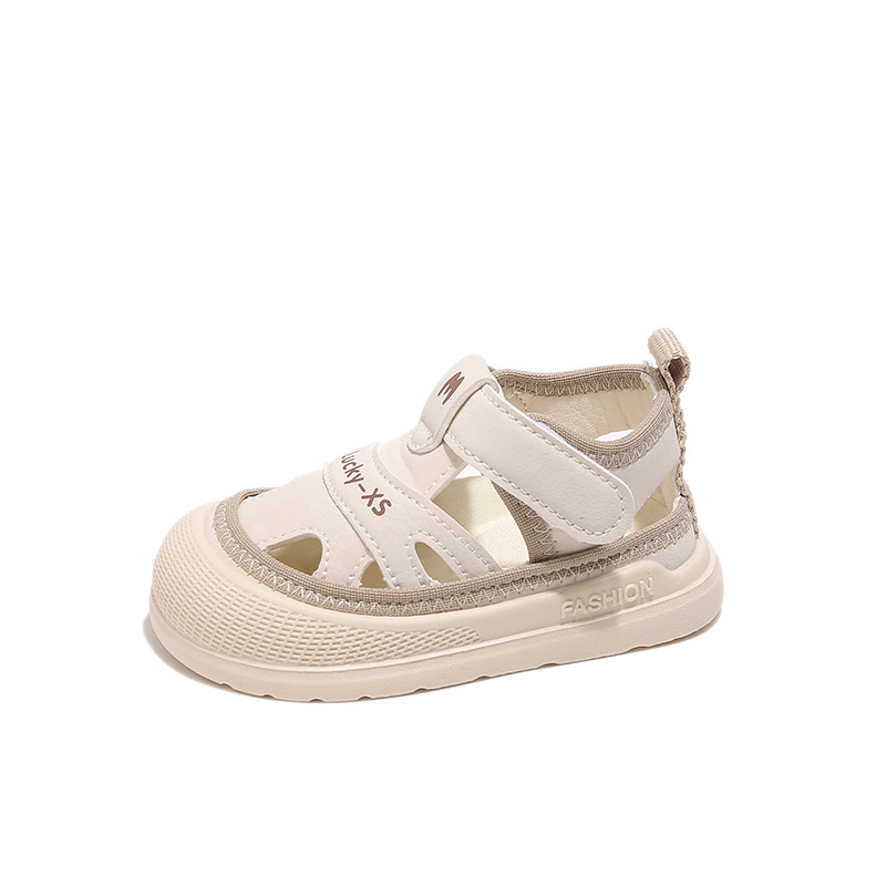 2025 verano nuevo estilo bebé media sandalias mujer bebé sandalias Baotou anti-patada hombre bebé verano zapatos en nombre del cabello