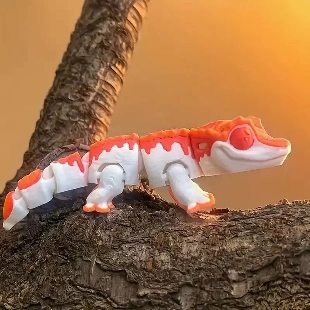 주황색 붉은 도마뱀붙이