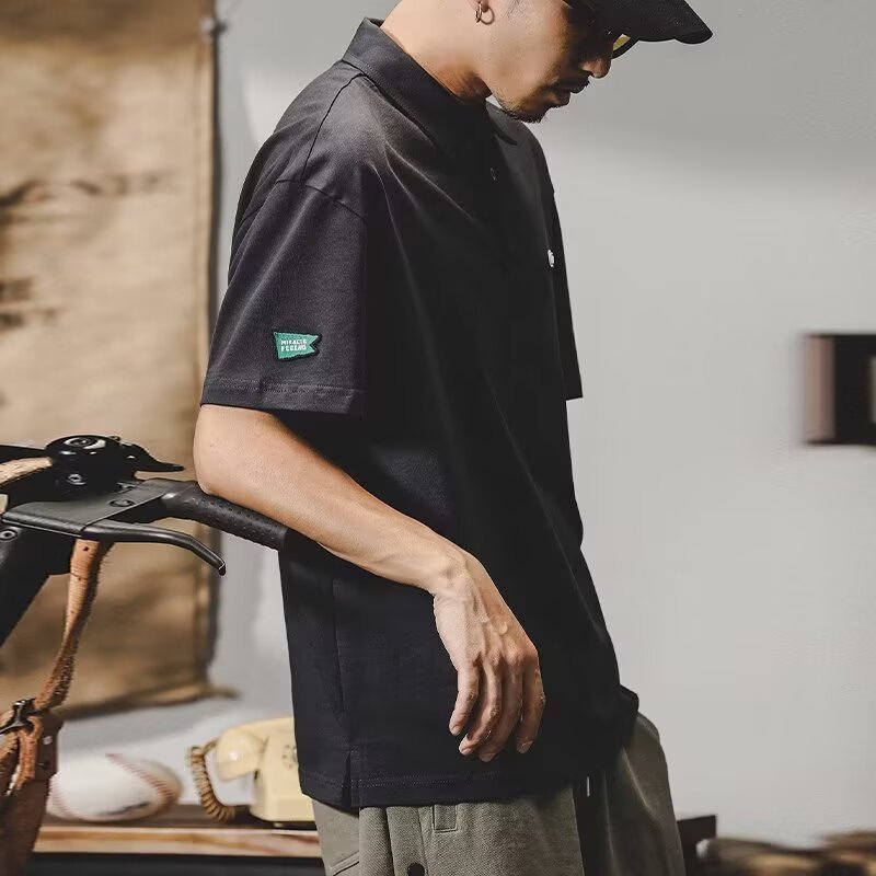 Polo de manga corta con solapa Camiseta de verano de marca de moda para hombres Versión coreana de la tendencia delgada 2025 nueva camiseta de todo fósforo