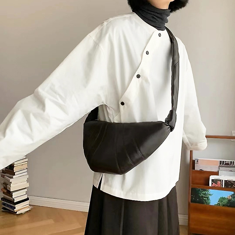 レトロな新しい本革の女性バッグの大衆デザインは牛革餃子バッグを賛美することができます。