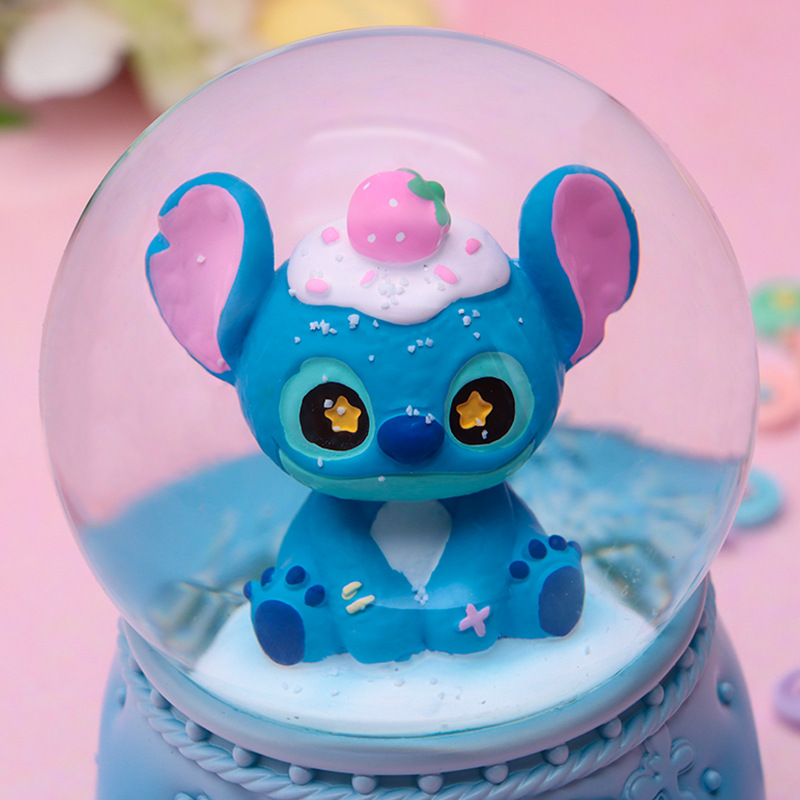 Linda y linda caja de música de bola de cristal Stitch, caja de música giratoria de nieve brillante, regalo para estudiantes y niños
