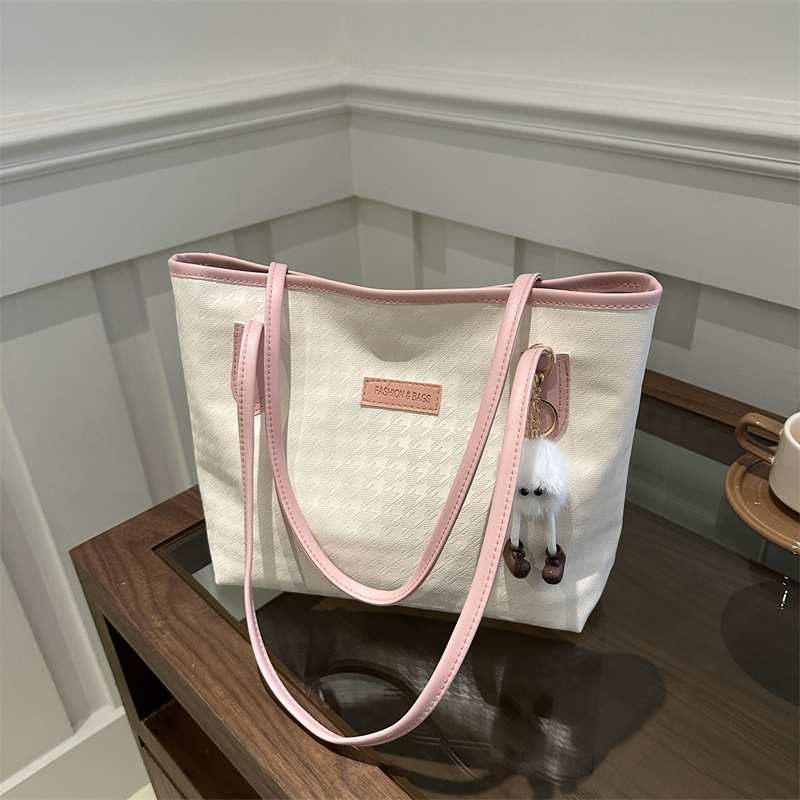 Bolso de mano de viaje al trabajo 2024 primavera nuevo bolso de ocio universal bolso de hombro brazo bolso de mano coreano