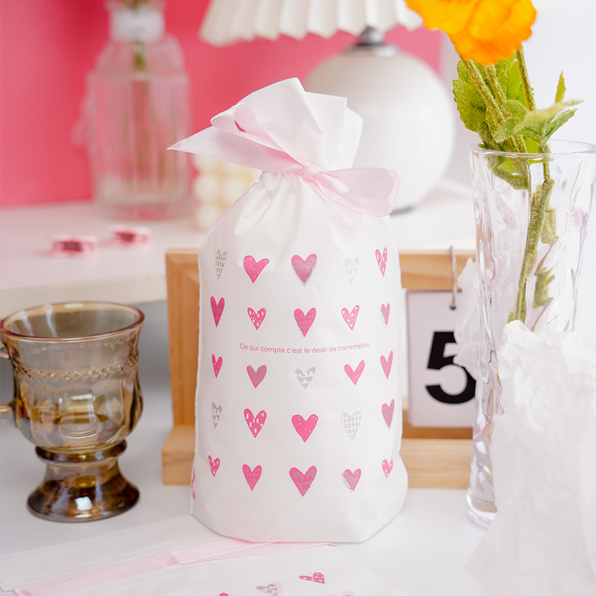 新款情人节雪花酥抽绳束口袋牛轧糖曲奇饼干礼物包装袋烘焙塑料袋