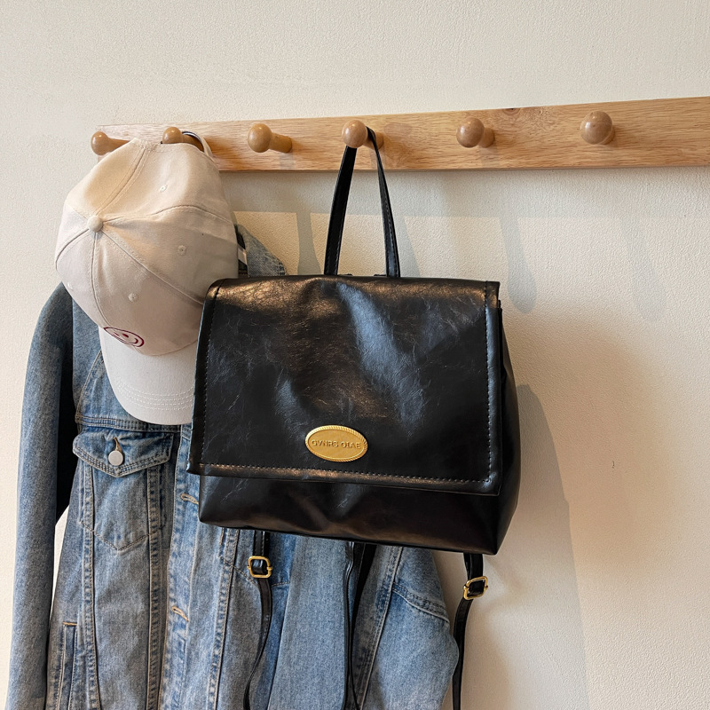 Mochila coreana retro de estilo universitario 2024 invierno nuevo simple de gran capacidad de mano mochila de hombro para viajar