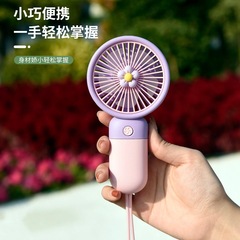 新しい花のミニは扇風機を持って携帯してusbを携帯して充電します。