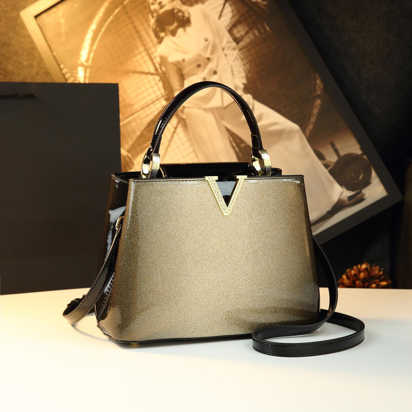 Bolso de gran capacidad para madres 2025, nuevo temperamento lujoso, bolso de mano de mujer de hombro de moda, bolso de cuero de mediana edad.