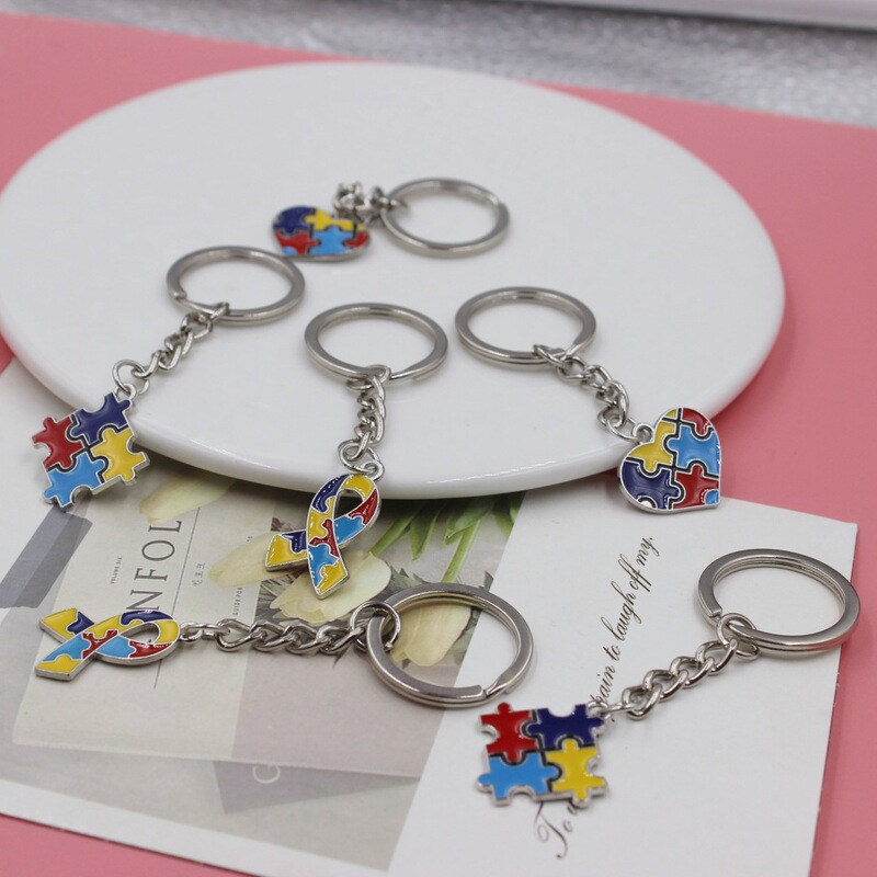 Amazon ETSY European and American best-selling new autism puzzle dripping oil car keychain pendant jewelry