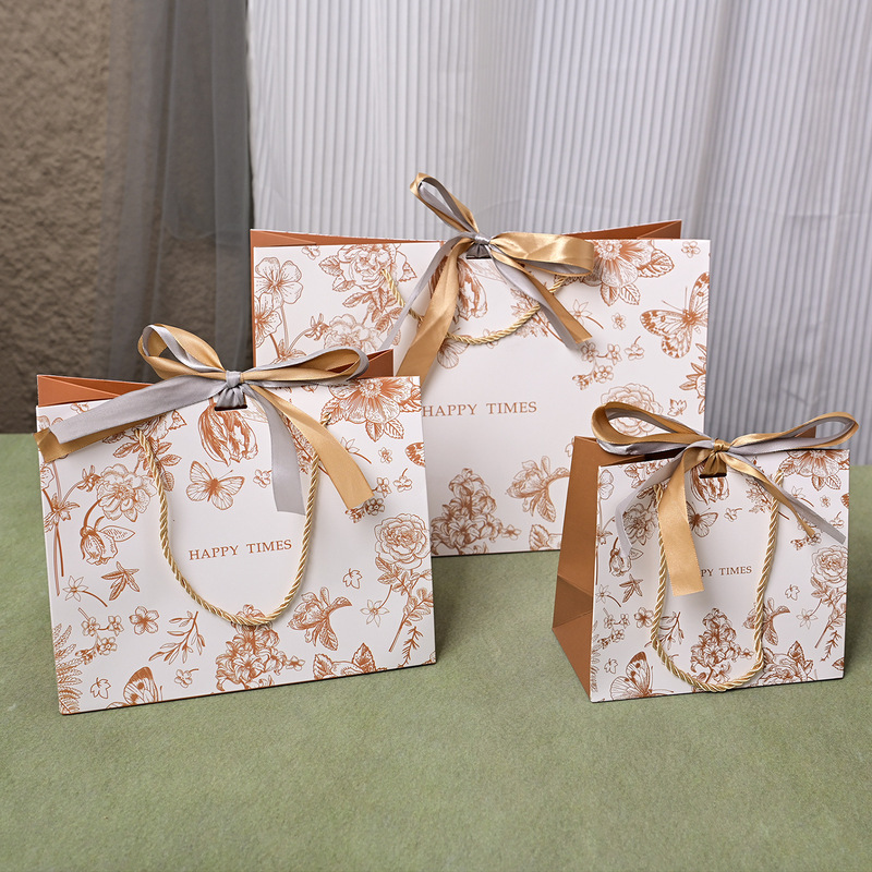 Cross-Border Gift Bag, Golden Flower Handbag, Gift Packaging Bag, Ready-Made Universal Paper Bag with Ribbon, Large Quantity Discount Cross-Border Gift Bag, Golden Flower Handbag, Gift Packaging Bag, Ready-Made Universal Paper Bag with Ribbon, Large Quantity Discount