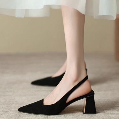 Oversized round-toe wedge sandals with a black, open-toe design featuring a pointed toe, a back strap, and a mid-heel. Perfect for summer fashion.