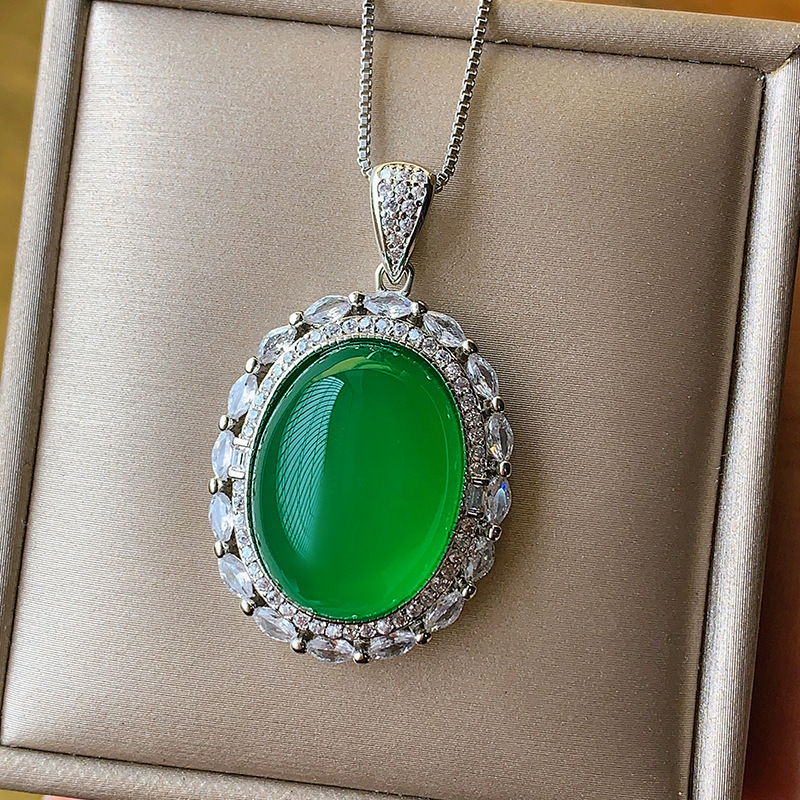 2024 nuevo estilo Zhuang Shengsheng joyería simulación paloma sangre rojo corindón cristal puntiagudo azul superficie lisa colgante retro maestro 15*20