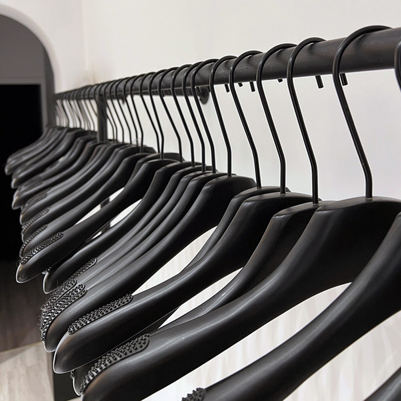 Women's clothing store, solid wood hangers, specifically for clothing stores, children's and men's clothing, black wooden, non-slip hangers, pants hangers, wholesale Women's clothing store, solid wood hangers, specifically for clothing stores, children's and men's clothing, black wooden, non-slip hangers, pants hangers, wholesale