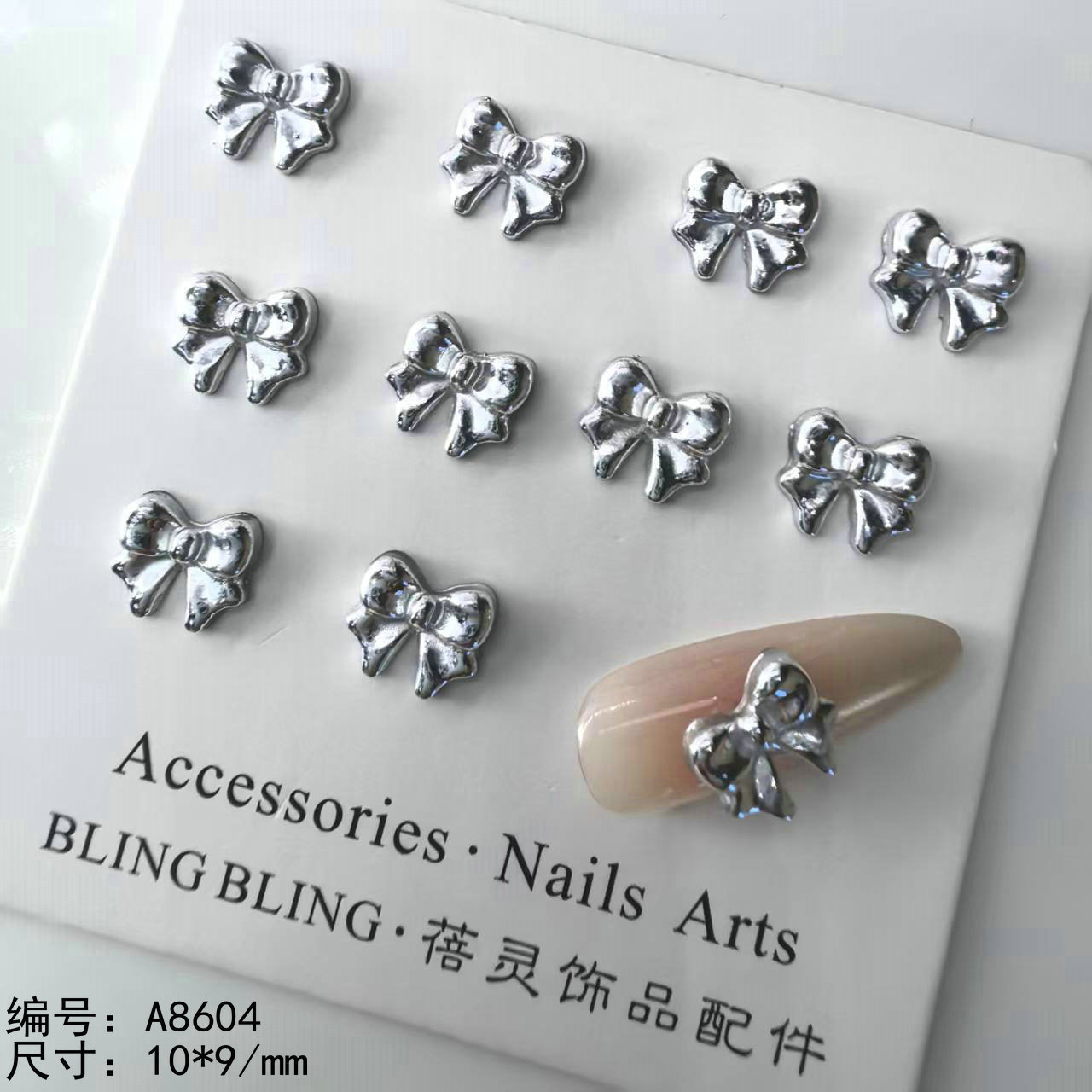 合金银色蝴蝶结美甲饰品批发工厂价.jpg