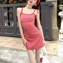 度假风吊带连衣裙女夏季新款洋气显瘦设计感红色格子露背A字短裙