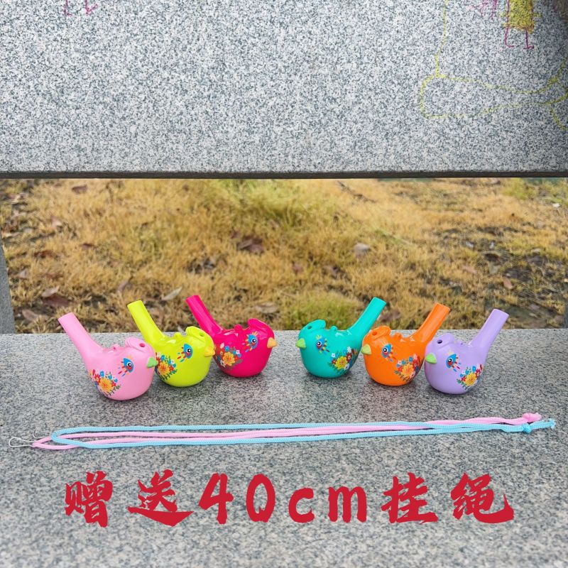 Fábrica al por mayor con agua que cambia el sonido del silbato de pájaro acuático al aire libre instrumento musical para niños silbato cuerno juguete parque puesto al por mayor