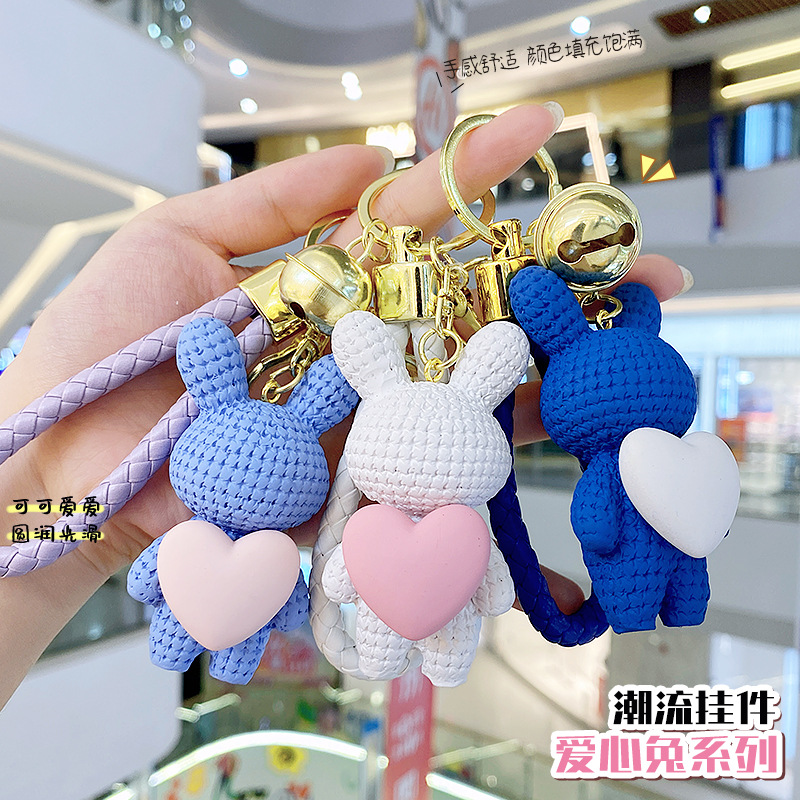 Resina creativa melocotón corazón tejido amor conejo llavero al por mayor ins pareja escuela coche llavero colgante