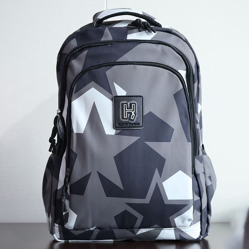 Al por mayor nueva mochila casual de la escuela secundaria de alta capacidad mochila de estudiantes de tendencia portátil universal bolsa de viaje de computadora