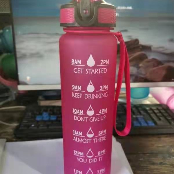 Fabricante en stock transfronterizo 1000ML caldera de rebote gradiente taza de agua escala portátil paja TRITAN taza deportiva