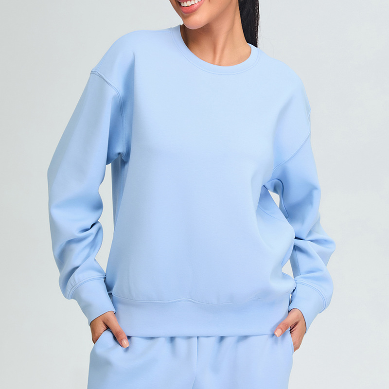 Otoño e invierno nuevo estilo modal suéter deportivo ropa de fitness top mujer al aire libre suelta casual adelgazante ropa de yoga de manga larga