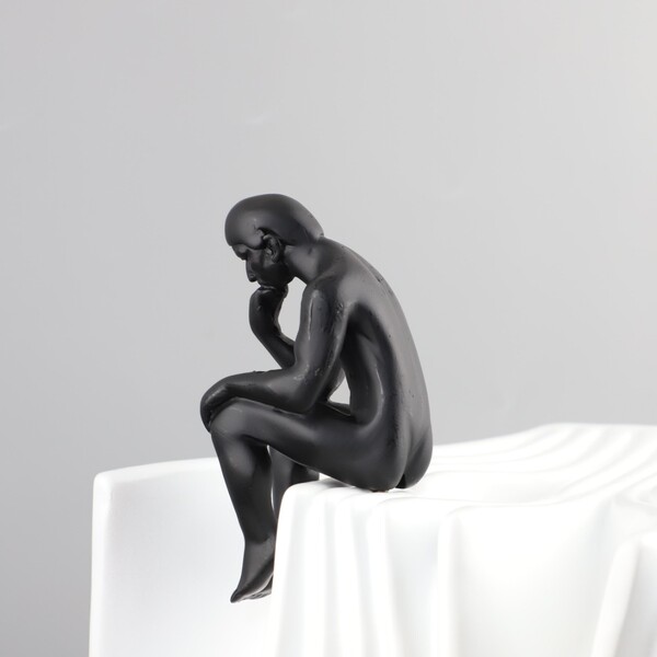 Modern minimalist abstract contempreters sitting in the book resin…