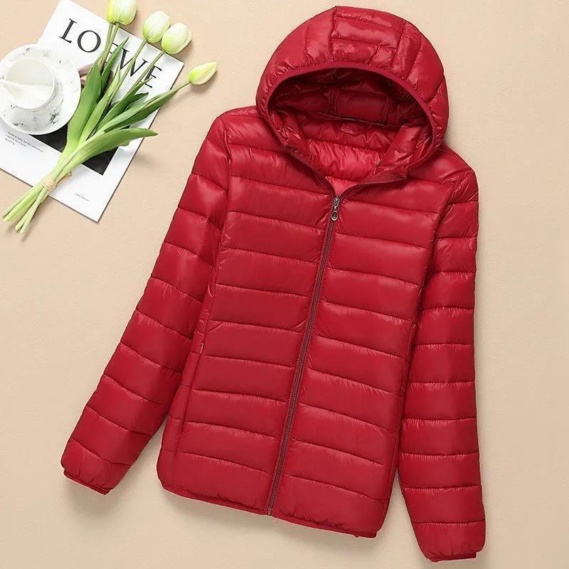 Abrigo de algodón acolchado ligero para mujer otoño e invierno abrigo de algodón acolchado 2022 nuevo estilo coreano suelto corto con capucha más abrigo de tamaño