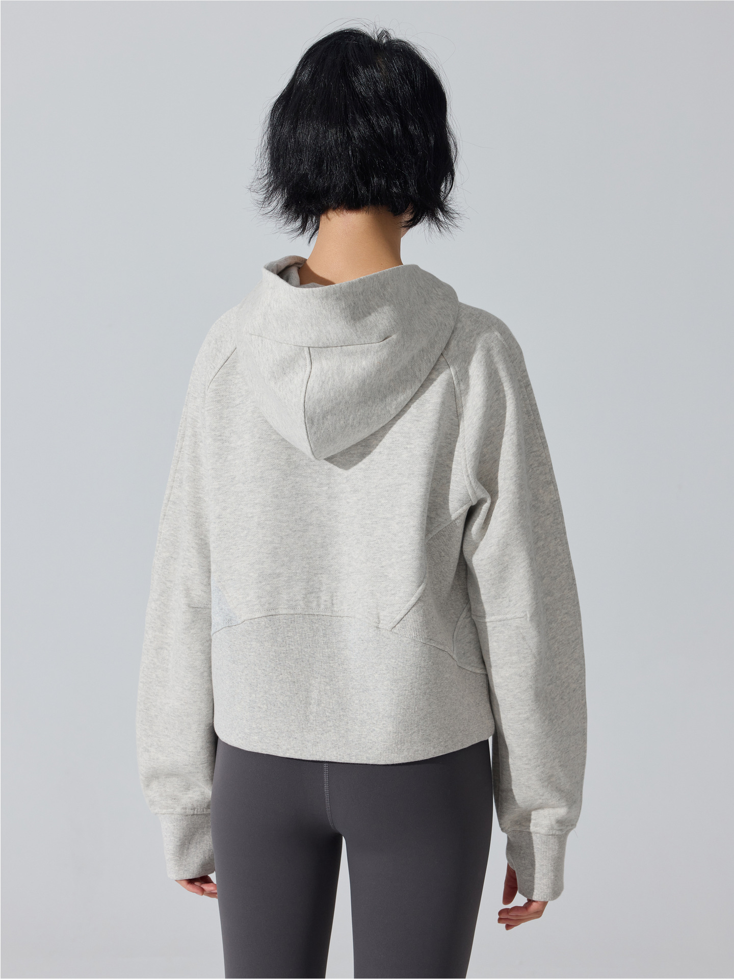 Otoño y invierno de moda con cremallera camiseta encapuchada calentadora y camiseta deportiva casual universal cardigan chaqueta de yoga superior mujer