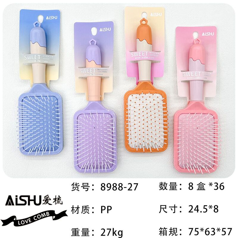 新商品のキャンディー色のクッションマッサージ櫛の半円の頭がふわふわしています。|undefined
