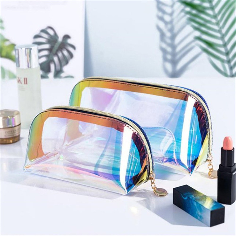 Wholesale laser-cut TPU cosmetic bags, waterproof and colorful PVC seashell toiletry bags, cross-border fashion storage bags