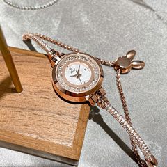 Light luxury women's watch SKHL time and space corridor rhinestone women's fashion shell surface temperament quicksand dial niche bracelet watch