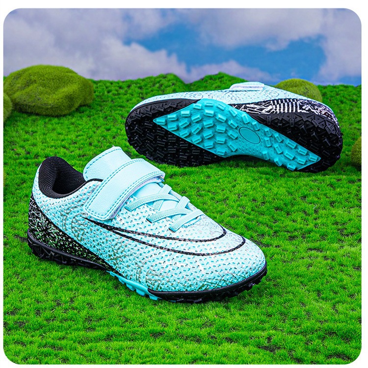 Zapatos de fútbol para niños con velcro bajo nuevo tipo de zapatos de entrenamiento transfronterizos de entrenamiento profesional de estudiantes de fútbol con clavos largos