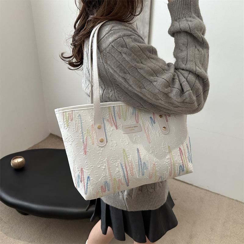 Bolsa de gran capacidad de viaje ocio para mujeres 2024 nueva moda para estudiantes universitarios en clase de hombro único bordado rayas bolsa de mano