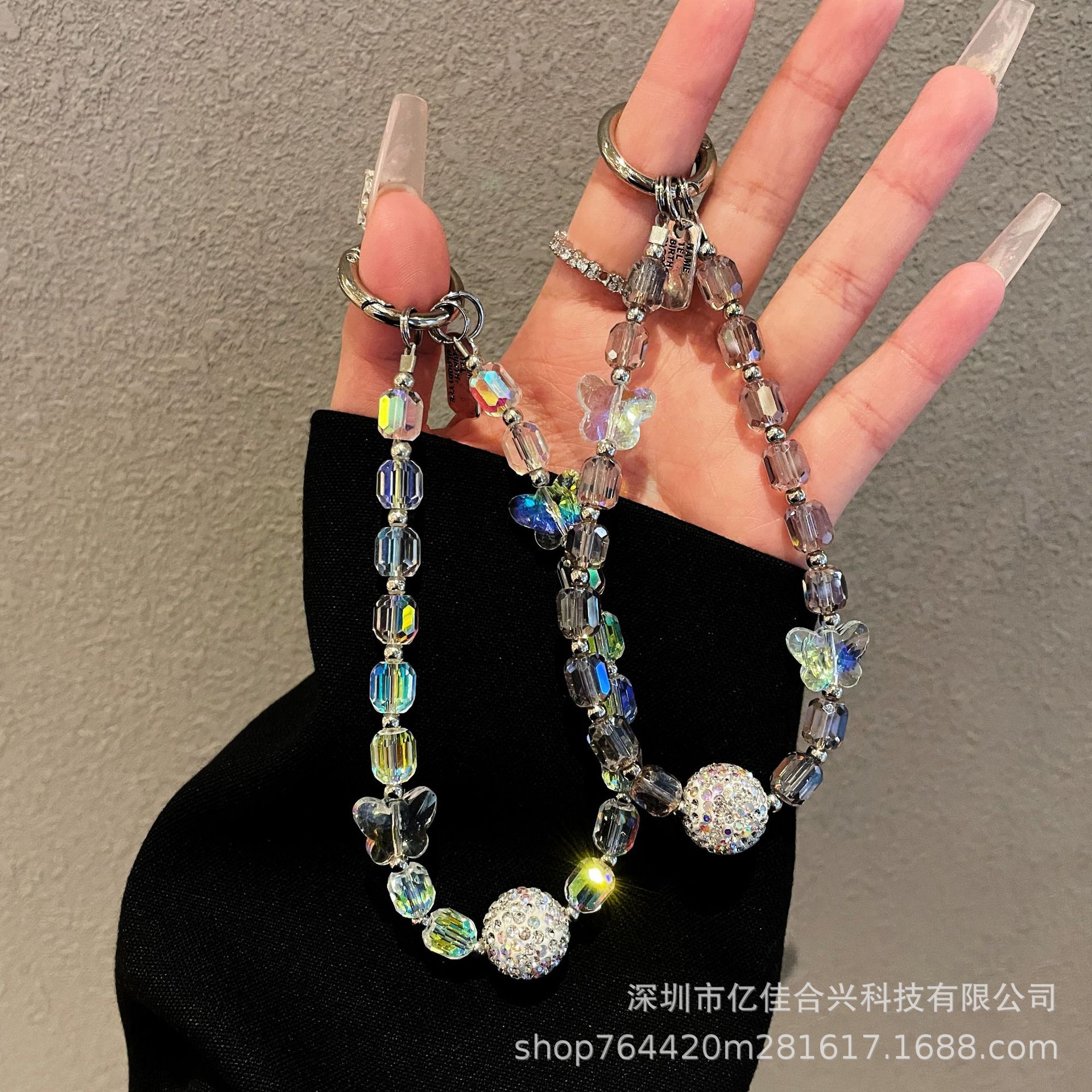 Japón y Corea del Sur estilo transfronterizo nuevo caso de teléfono móvil colgante cadena de cristal string arco de diamante cadena de teléfono móvil colgante de muñeca