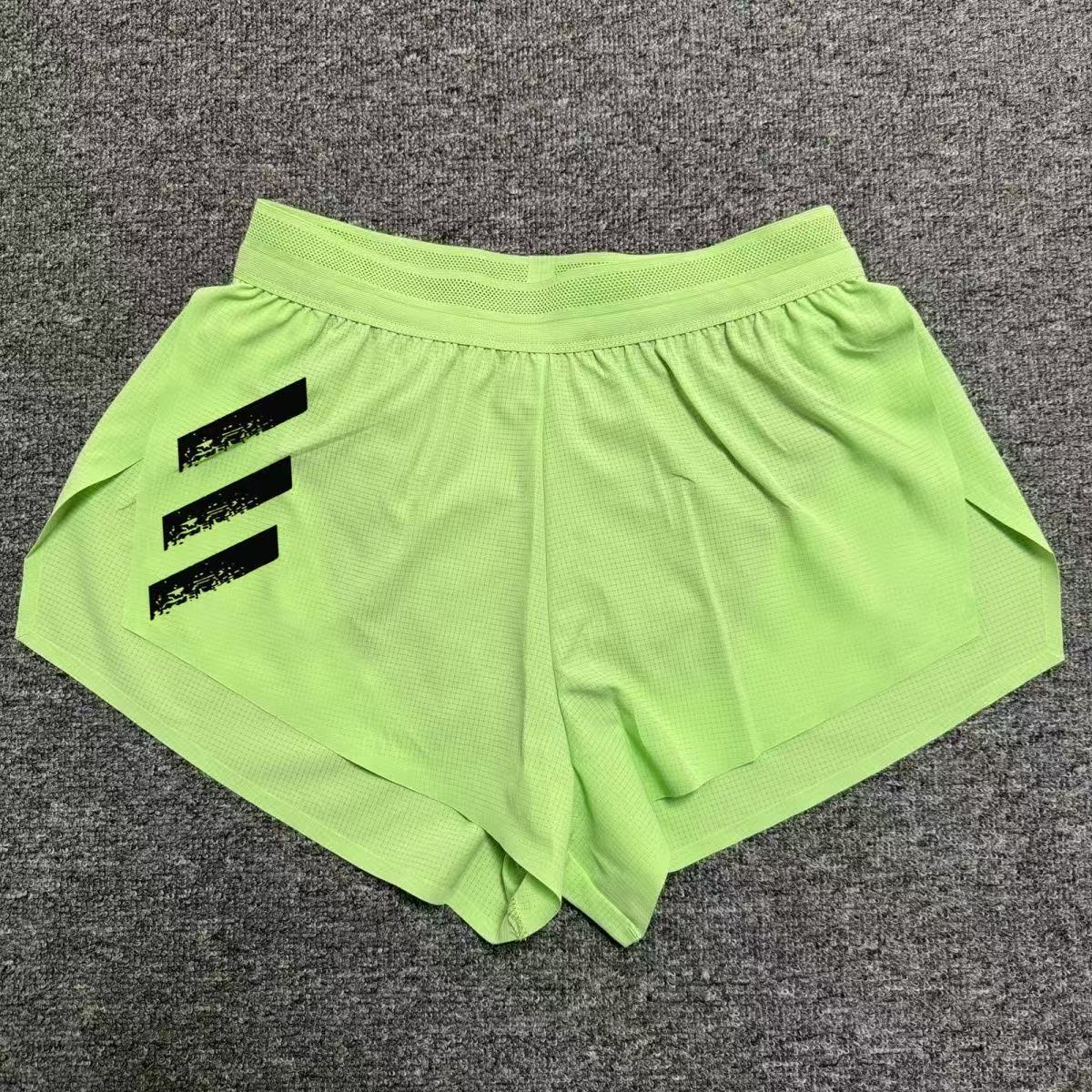 スポーツランニング三分トレーニングパンツ男性プロマラソン側開帯ライニング速乾通気陸上パンツ